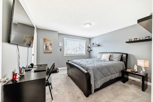 288 Copperstone Cove Se, Calgary, AB - Indoor Photo Showing Bedroom