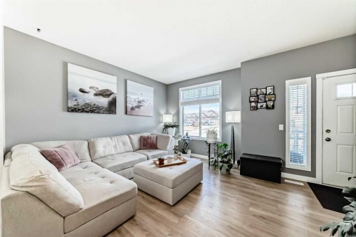 288 Copperstone Cove Se, Calgary, AB - Indoor Photo Showing Living Room