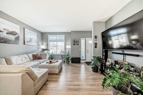 288 Copperstone Cove Se, Calgary, AB - Indoor Photo Showing Living Room