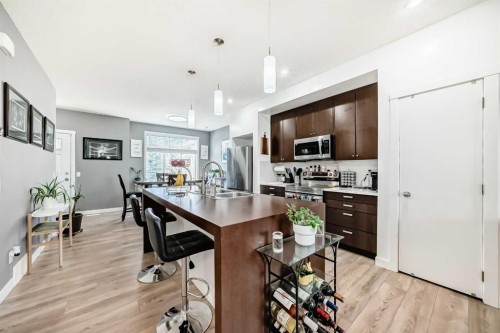 288 Copperstone Cove Se, Calgary, AB - Indoor Photo Showing Kitchen With Double Sink