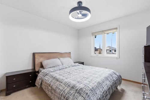 83 Coral Springs Grove Ne, Calgary, AB - Indoor Photo Showing Bedroom
