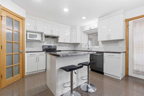 83 Coral Springs Grove Ne, Calgary, AB - Indoor Photo Showing Kitchen With Upgraded Kitchen