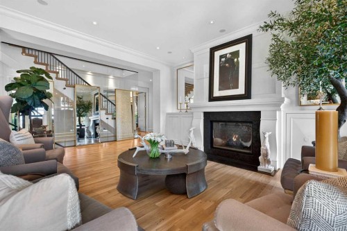 4215 16A Street Sw, Calgary, AB - Indoor Photo Showing Living Room With Fireplace