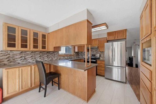 119 Macewan Meadow Way Nw, Calgary, AB - Indoor Photo Showing Kitchen With Stainless Steel Kitchen