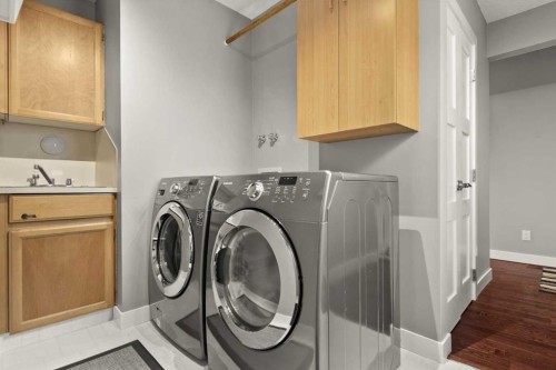244 Ranchridge Bay Nw, Calgary, AB - Indoor Photo Showing Laundry Room