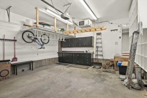 244 Ranchridge Bay Nw, Calgary, AB - Indoor Photo Showing Garage
