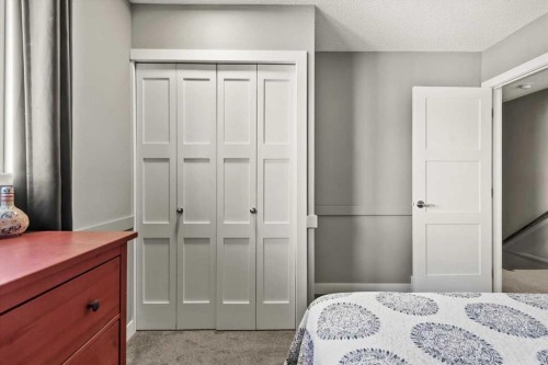 244 Ranchridge Bay Nw, Calgary, AB - Indoor Photo Showing Bedroom