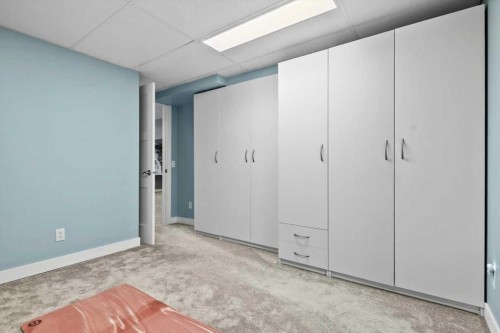 244 Ranchridge Bay Nw, Calgary, AB - Indoor Photo Showing Other Room