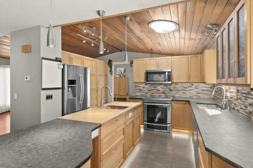 244 Ranchridge Bay Nw, Calgary, AB - Indoor Photo Showing Kitchen With Upgraded Kitchen