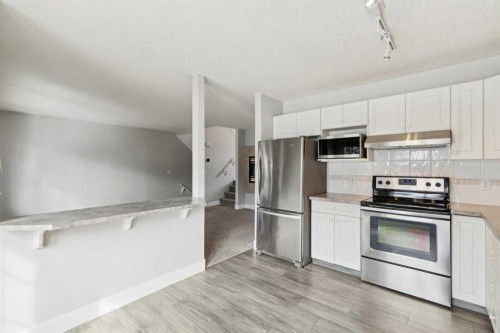 328 Prominence Heights Sw, Calgary, AB - Indoor Photo Showing Kitchen