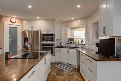 88 Woodacres Drive Sw, Calgary, AB - Indoor Photo Showing Kitchen With Stainless Steel Kitchen With Upgraded Kitchen