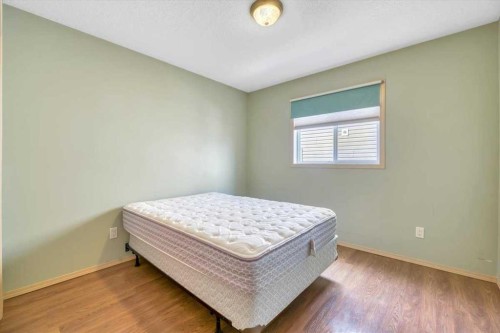 10 Valley Ridge Place Ne, Diamond Valley, AB - Indoor Photo Showing Bedroom