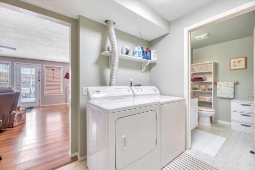 10 Valley Ridge Place Ne, Diamond Valley, AB - Indoor Photo Showing Laundry Room