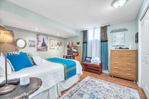 10 Valley Ridge Place Ne, Diamond Valley, AB - Indoor Photo Showing Bedroom