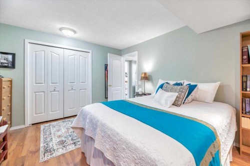 10 Valley Ridge Place Ne, Diamond Valley, AB - Indoor Photo Showing Bedroom