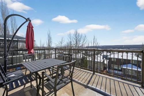 122 Springbluff Boulevard Sw, Calgary, AB - Outdoor With Deck Patio Veranda