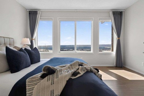122 Springbluff Boulevard Sw, Calgary, AB - Indoor Photo Showing Bedroom
