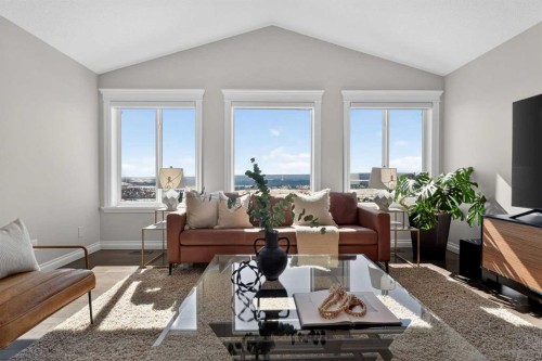 122 Springbluff Boulevard Sw, Calgary, AB - Indoor Photo Showing Living Room