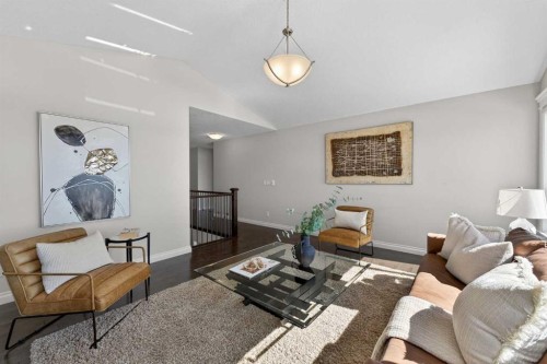 122 Springbluff Boulevard Sw, Calgary, AB - Indoor Photo Showing Living Room