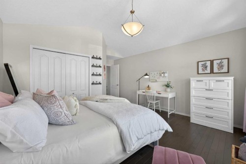 122 Springbluff Boulevard Sw, Calgary, AB - Indoor Photo Showing Bedroom