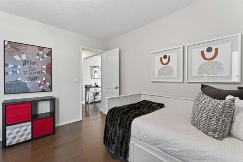 122 Springbluff Boulevard Sw, Calgary, AB - Indoor Photo Showing Bedroom