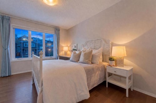 122 Springbluff Boulevard Sw, Calgary, AB - Indoor Photo Showing Bedroom