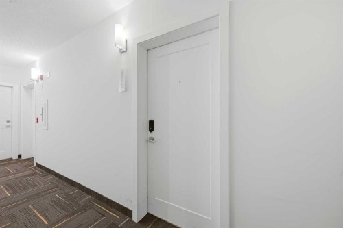 2303-76 Cornerstone Passage Ne, Calgary, AB - Indoor Photo Showing Other Room