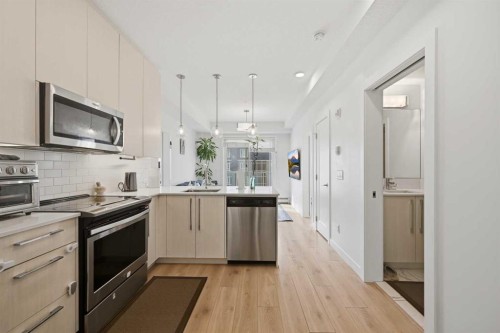 2303-76 Cornerstone Passage Ne, Calgary, AB - Indoor Photo Showing Kitchen With Stainless Steel Kitchen With Upgraded Kitchen