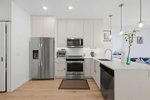2303-76 Cornerstone Passage Ne, Calgary, AB - Indoor Photo Showing Kitchen With Stainless Steel Kitchen With Upgraded Kitchen