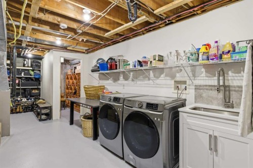 12 Varsville Place Nw, Calgary, AB - Indoor Photo Showing Laundry Room