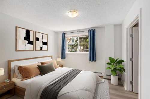 101-655 Meredith Road Ne, Calgary, AB - Indoor Photo Showing Bedroom