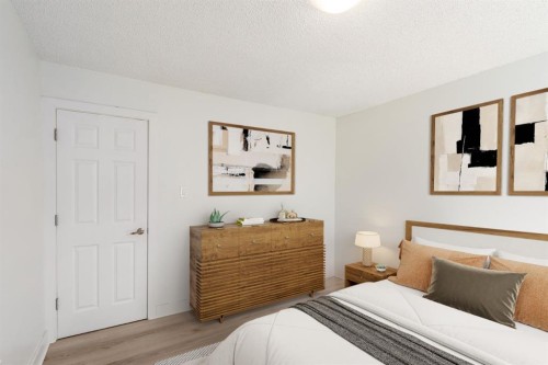 101-655 Meredith Road Ne, Calgary, AB - Indoor Photo Showing Bedroom