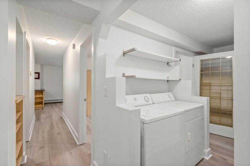 101-655 Meredith Road Ne, Calgary, AB - Indoor Photo Showing Laundry Room