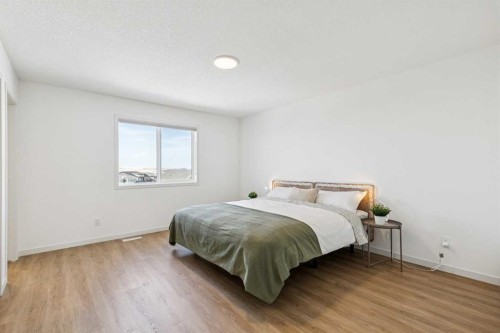 150 Lucas Close Nw, Calgary, AB - Indoor Photo Showing Bedroom
