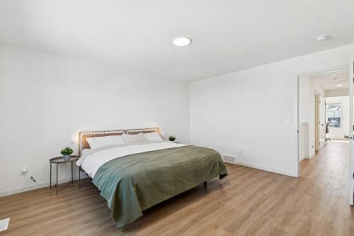150 Lucas Close Nw, Calgary, AB - Indoor Photo Showing Bedroom