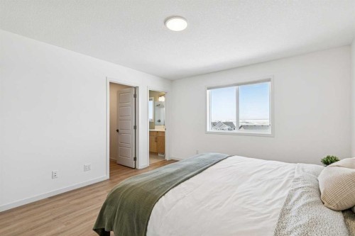 150 Lucas Close Nw, Calgary, AB - Indoor Photo Showing Bedroom