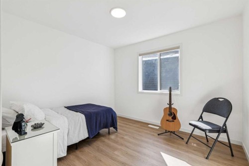 150 Lucas Close Nw, Calgary, AB - Indoor Photo Showing Bedroom