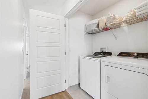 150 Lucas Close Nw, Calgary, AB - Indoor Photo Showing Laundry Room