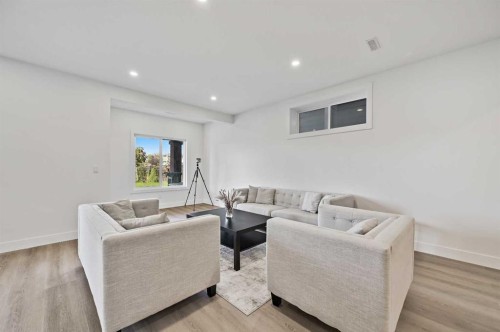 13 Cranbrook Cove Se, Calgary, AB - Indoor Photo Showing Living Room