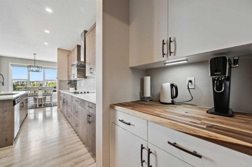 13 Cranbrook Cove Se, Calgary, AB - Indoor Photo Showing Kitchen With Upgraded Kitchen