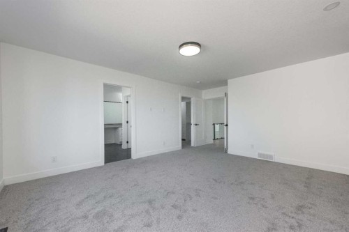 43 Saddlecrest Link Ne, Calgary, AB - Indoor Photo Showing Other Room