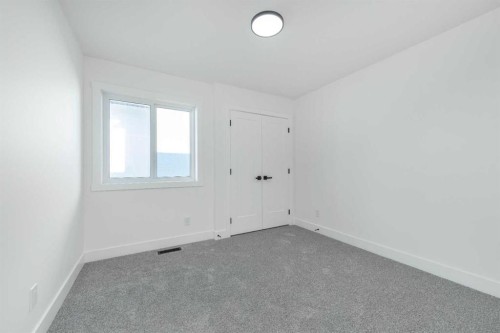 43 Saddlecrest Link Ne, Calgary, AB - Indoor Photo Showing Other Room