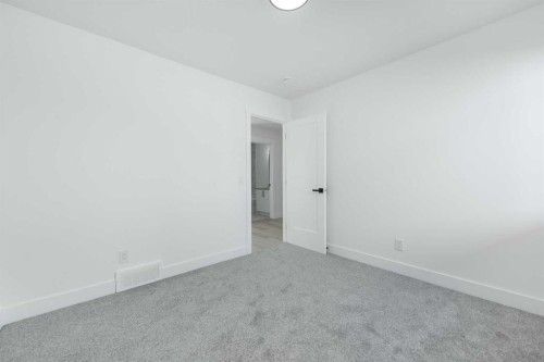 43 Saddlecrest Link Ne, Calgary, AB - Indoor Photo Showing Other Room