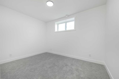 43 Saddlecrest Link Ne, Calgary, AB - Indoor Photo Showing Other Room