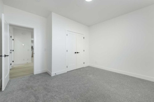 43 Saddlecrest Link Ne, Calgary, AB - Indoor Photo Showing Other Room