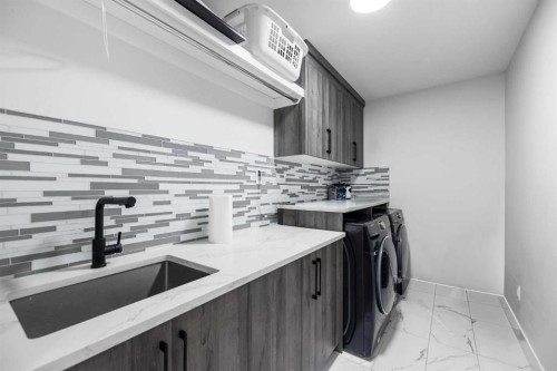45 Waterford Terrace, Chestermere, AB - Indoor Photo Showing Laundry Room