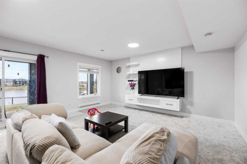 45 Waterford Terrace, Chestermere, AB - Indoor Photo Showing Living Room