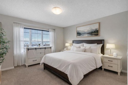 124 Panamount Way Nw, Calgary, AB - Indoor Photo Showing Bedroom