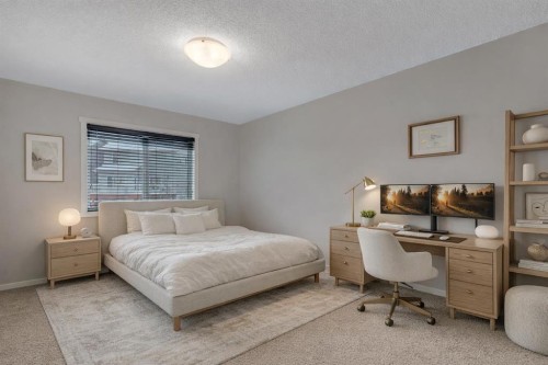 124 Panamount Way Nw, Calgary, AB - Indoor Photo Showing Bedroom