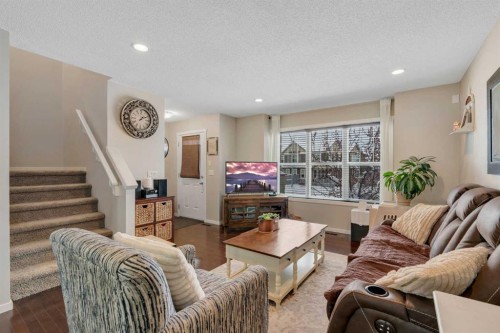 124 Panamount Way Nw, Calgary, AB - Indoor Photo Showing Living Room